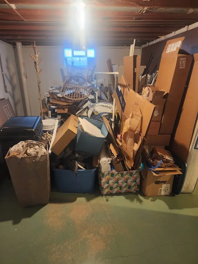 Roll-off dumpster container at job site for Yard Waste Dumpster Rental in Moorefield